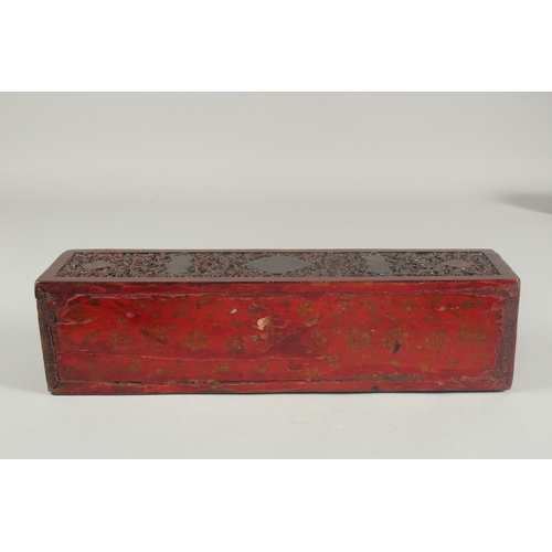 261 - A RARE 18TH CENTURY MUGHAL INDIAN CARVED PAINTED AND LACQUERED WOODEN PEN BOX, 36cm x 9cm.