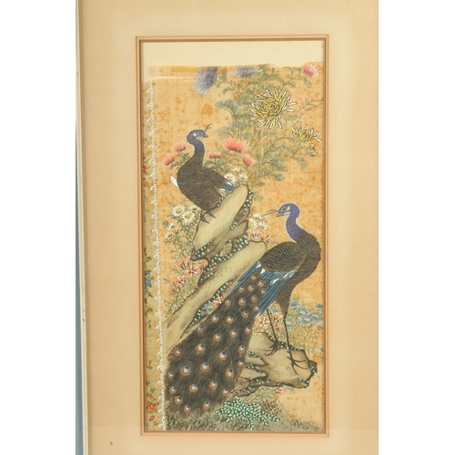 27 - A FINE CHINESE GOUACHE PAINTING ON SILK, depicting peacocks with gilt highlights, framed and glazed,... 