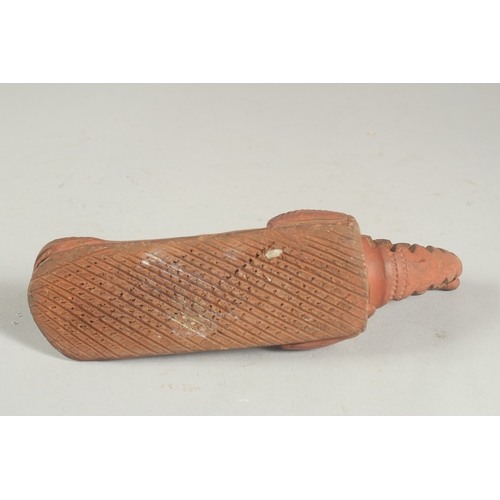 272 - TWO LATE 19TH CENTURY OTTOMAN TURKISH OR EYGPTION RED CLAY FOOT SCRAPERS formed as crocodiles, 22cm ... 