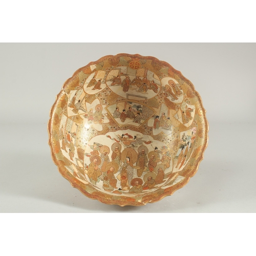 273 - A FINE LARGE JAPANESE SATSUMA FOOTED BOWL, signed to the base, 24cm diameter, (af).