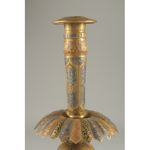 274 - A LARGE 19TH CENTURY PERSIAN QAJAR SILVER INLAID ENAMELLED BRASS CANDLESTICK, 39cm high.