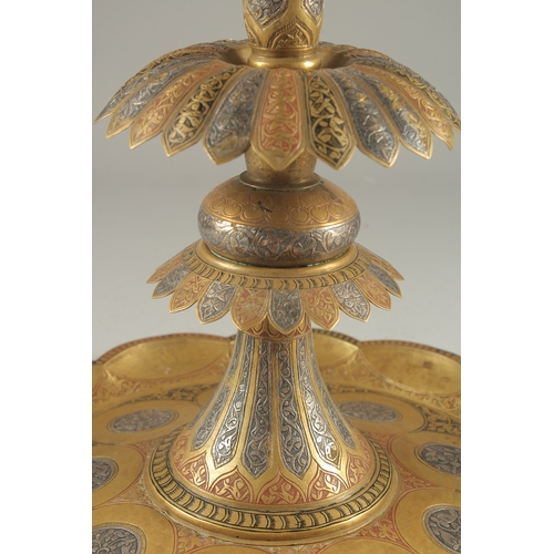 274 - A LARGE 19TH CENTURY PERSIAN QAJAR SILVER INLAID ENAMELLED BRASS CANDLESTICK, 39cm high.