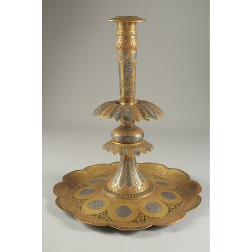 274 - A LARGE 19TH CENTURY PERSIAN QAJAR SILVER INLAID ENAMELLED BRASS CANDLESTICK, 39cm high.