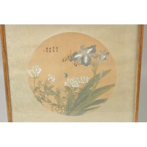 29 - TWO FRAMED CHINESE PAINTINGS ON SILK, one fan painting depicting a mountainous landscape, the other ... 