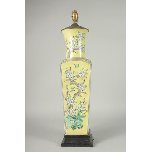 43 - A LARGE CHINESE FAMILLE JAUNE PORCELAIN SQUARE-FORM VASE, converted to a lamp, painted with blossomi... 