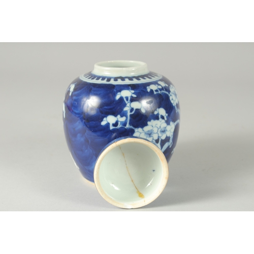 46 - A CHINESE BLUE AND WHITE PORCELAIN PRUNUS JAR AND COVER, (cover repair), 14.5cm high.