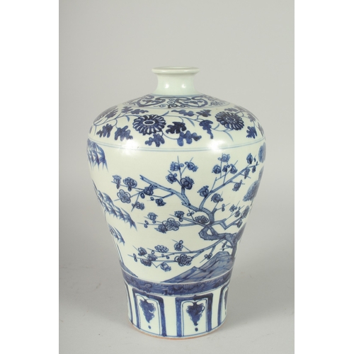 49 - A CHINESE BLUE AND WHITE PORCELAIN MEIPING VASE, painted with a continuous band of various trees, th... 