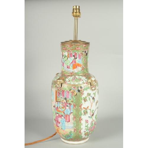 55 - A CHINESE CANTON FAMILLE ROSE PORCELAIN VASE LAMP, (af), 49cm high overall.