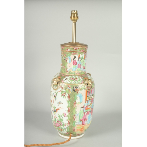 55 - A CHINESE CANTON FAMILLE ROSE PORCELAIN VASE LAMP, (af), 49cm high overall.