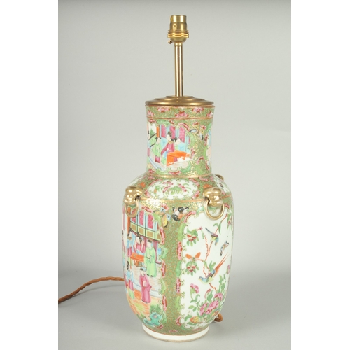 55 - A CHINESE CANTON FAMILLE ROSE PORCELAIN VASE LAMP, (af), 49cm high overall.