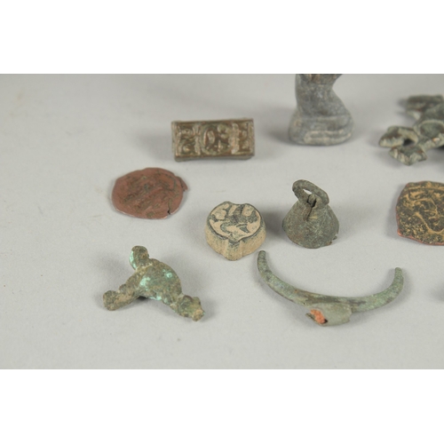 569 - A COLLECTION OF ISLAMIC - POSSIBLY NISHAPUR METAL RELICS, (qty).