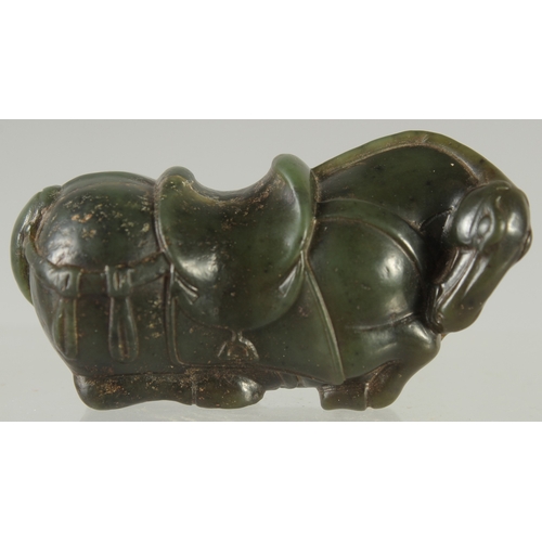 583 - A GREEN HARDSTONE FIGURE OF A HORSE, 7cm long.