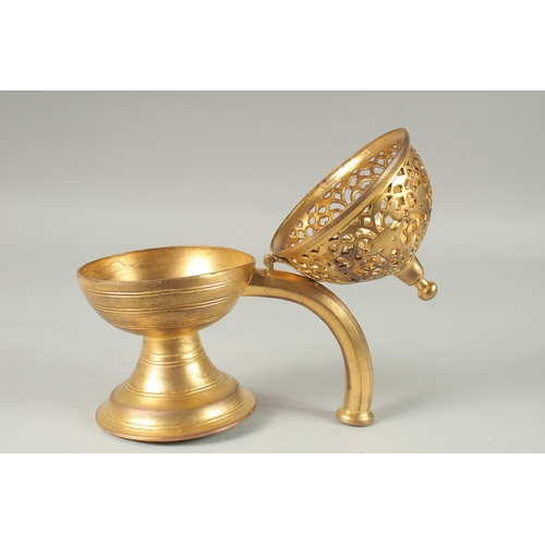 587 - AN OTTOMAN TURKISH TOMBAK INCENSE BURNER, 20cm long.