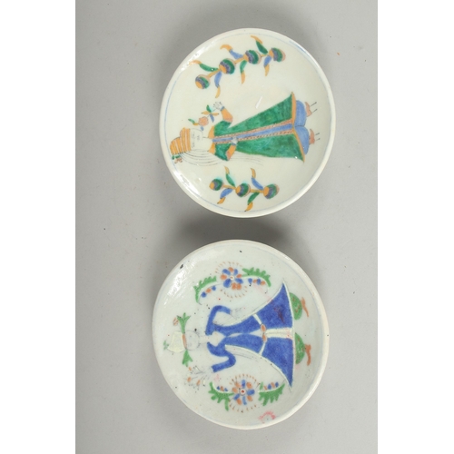 588 - TWO TURKISH KUTAHYA GLAZED POTTERY DISHES, 14cm diameter.