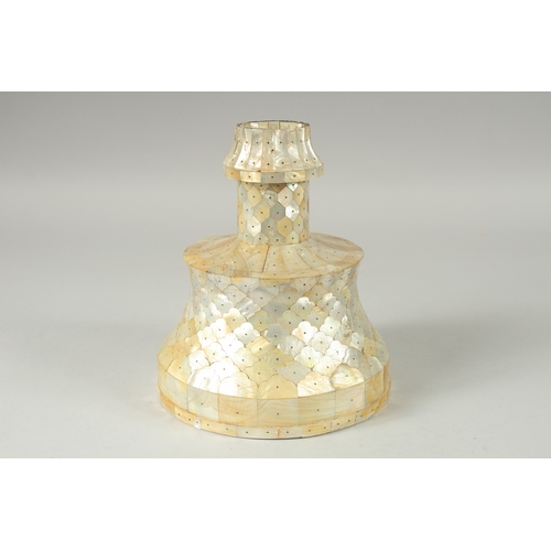 589 - A RARE OTTOMAN MOTHER OF PEARL CANDLESTICK, 22cm high.