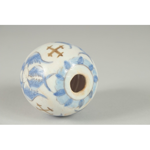 594 - A TURKISH OTTOMAN ARMENIAN POTTERY HANGING BALL, 8cm.