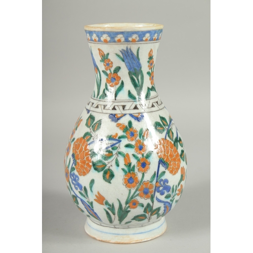 596 - AN OTTOMAN TURKISH KUTAHYA GLAZED POTTERY WATER FLASK, 23cm high.