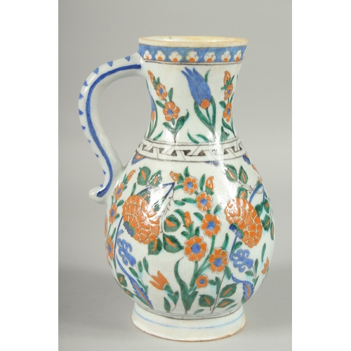 596 - AN OTTOMAN TURKISH KUTAHYA GLAZED POTTERY WATER FLASK, 23cm high.