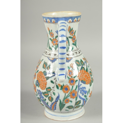 596 - AN OTTOMAN TURKISH KUTAHYA GLAZED POTTERY WATER FLASK, 23cm high.