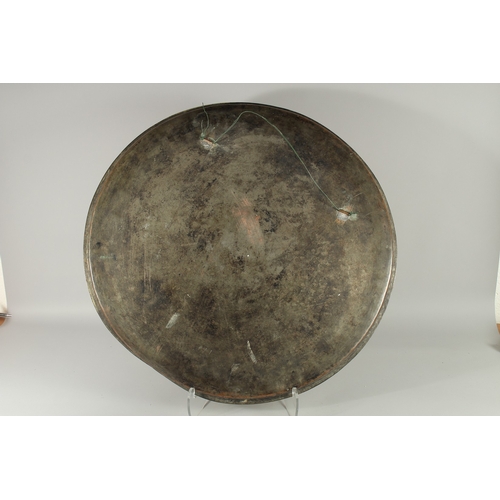 608 - A LARGE 18TH CENTURY OTTOMAN ENGRAVED COPPER TRAY, with Hebrew inscription, dated, 69cm diameter.