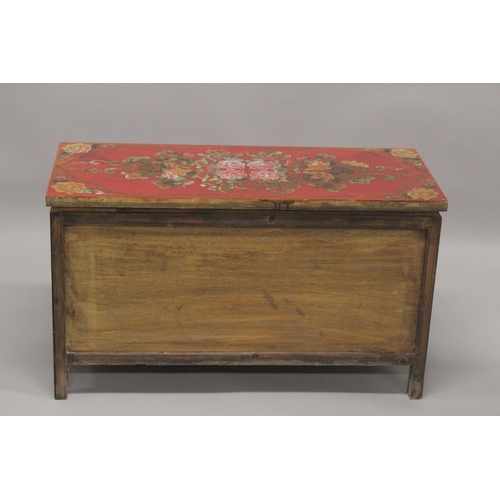 612 - A 20TH CENTURY CHINESE PAINTED LOW CUPBOARD, the rectangular top painted with flowers, similarly dec... 