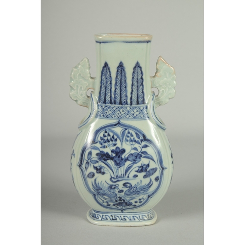 66 - A CHINESE BLUE AND WHITE PORCELAIN TWIN HANDLE VASE, painted with panels of ducks and lotus, 20.5cm ... 