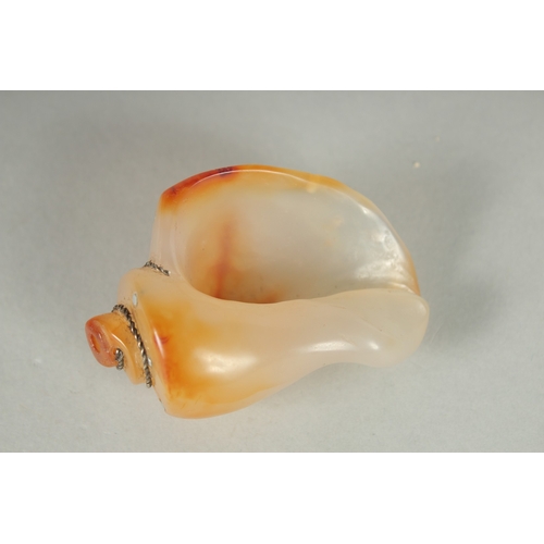 82 - A CARVED AGATE CONCH SHELL, 7cm long.