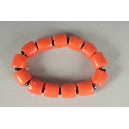 84 - A FAUX CORAL BRACELET.