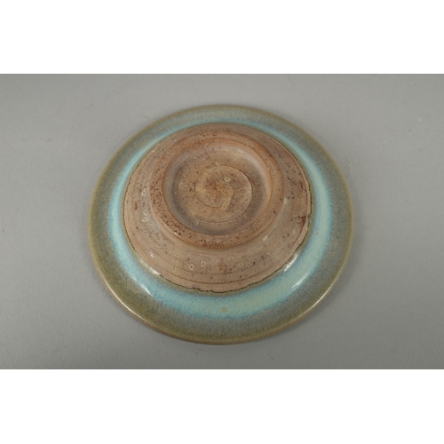 88 - A SMALL CHINESE JUN STYLE SAUCER DISH, 10cm diameter.