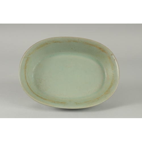 89 - A CHINESE RU WARE OVAL-FORM PLANTER, raised on four legs, 22.5cm x 16.5cm.