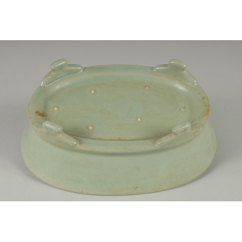 89 - A CHINESE RU WARE OVAL-FORM PLANTER, raised on four legs, 22.5cm x 16.5cm.