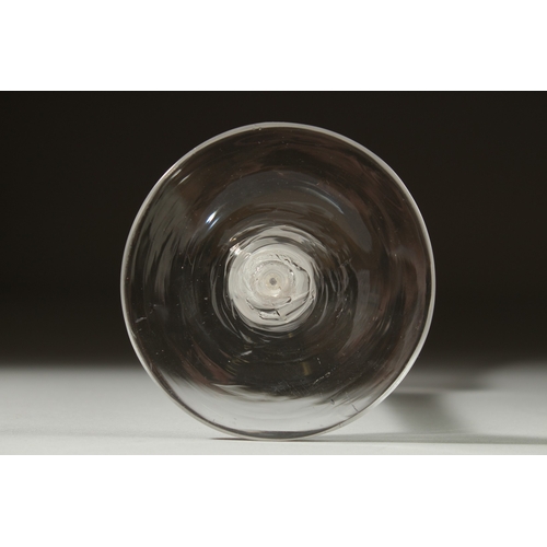 1031 - A GEORGIAN WINE GLASS with inverted bell shape bowl and white twist stem. 6ins high.