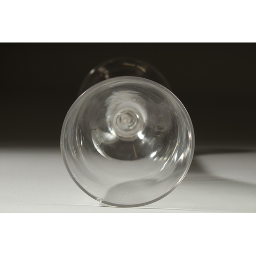 1033 - A LARGE GEORGIAN RUMMER GLASS with plain bowl. 3cms diameter and white twist stem 6.5ins high.... 