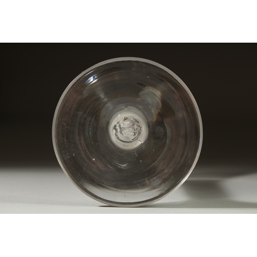 1033 - A LARGE GEORGIAN RUMMER GLASS with plain bowl. 3cms diameter and white twist stem 6.5ins high.... 