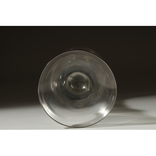 1037 - A LARGE PLAIN GEORGIAN GLASS with inverted bell shaped bowl. 6.5ins high.