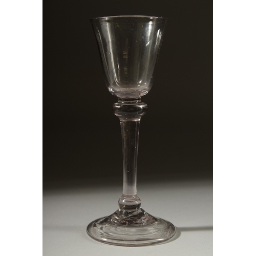 1038 - A LARGE PLAIN GEORGIAN GLASS with double knop stem. 6ins high.