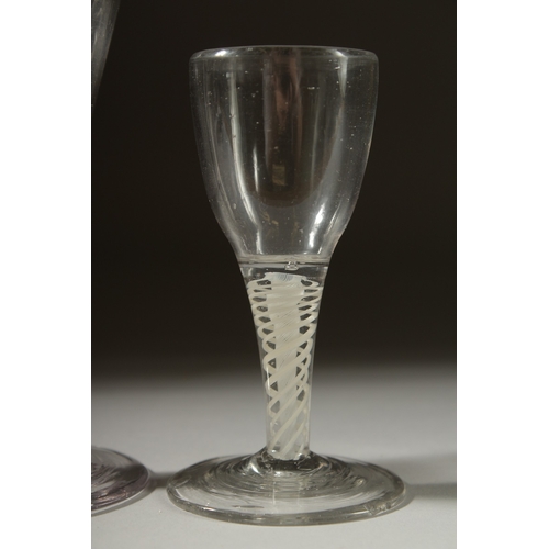 1040 - TWO SMALL GEORGIAN GLASSES both with white short stems. 4ins & 5ins high.