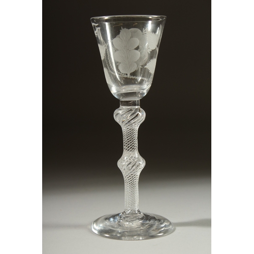 1045 - A SUPERB JACOBITE WINE GLASS the bowl engraved with roses, wtih air twist and knop stem. 6.5ins high... 