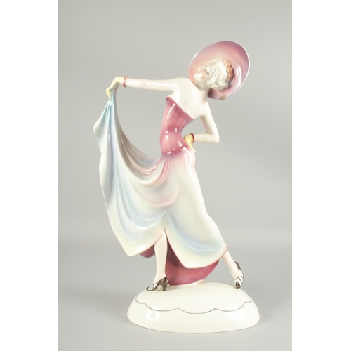 1080 - A LARGE DECO PORCELAIN LADY. 19ins high.