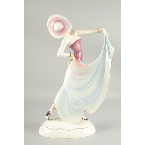 1080 - A LARGE DECO PORCELAIN LADY. 19ins high.