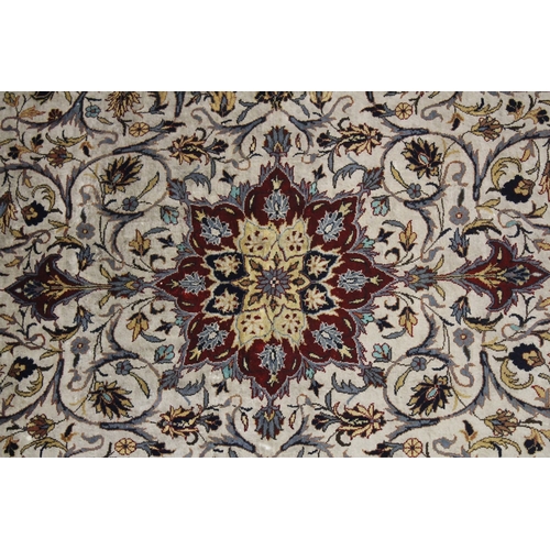 1005 - A GOOD SMALL PERSIAN SILK RUG beige ground with all over stylised decoration. 5ft x 3ft.