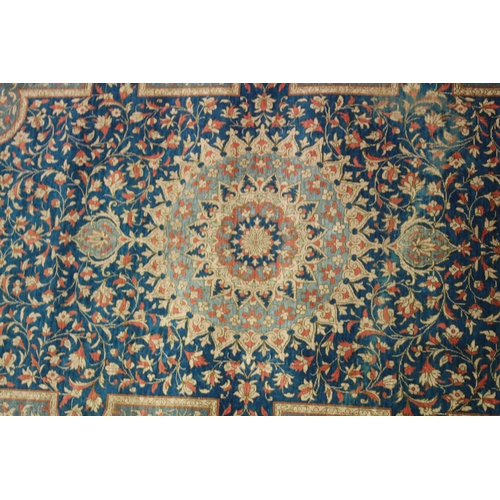 1006 - A GOOD SMALL PERSIAN SILK RUG turquoise ground with fine floral decoration. Signed. 4ft 10ins x 3ft ... 