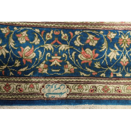 1006 - A GOOD SMALL PERSIAN SILK RUG turquoise ground with fine floral decoration. Signed. 4ft 10ins x 3ft ... 