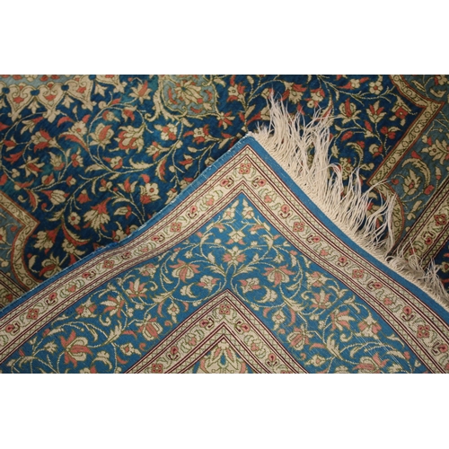 1006 - A GOOD SMALL PERSIAN SILK RUG turquoise ground with fine floral decoration. Signed. 4ft 10ins x 3ft ... 