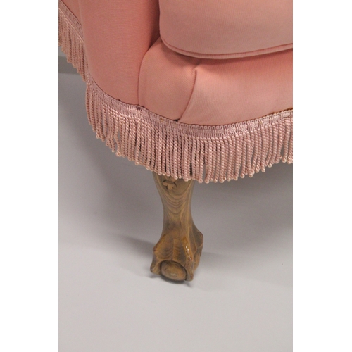 1022 - A PAIR OF PINK WING ARM CHAIRS on cabriole legs.