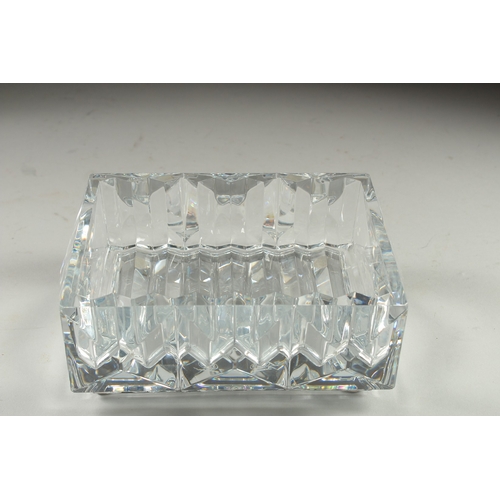 1056 - A HEAVY BACCARAT RECTANGULAR ASH TRAY. 6ins long, 4.5ins wide, 2.25ins deep.