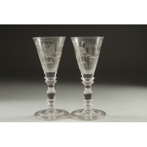 1061 - A GOOD PAIR OF WINE GLASSES engraved 