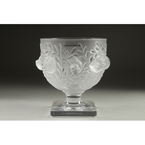 1064 - A LALIQUE FROSTED GLASS BOWL surrounded by chubby birds,  on a plain square base. Signed Lalique, Fr... 