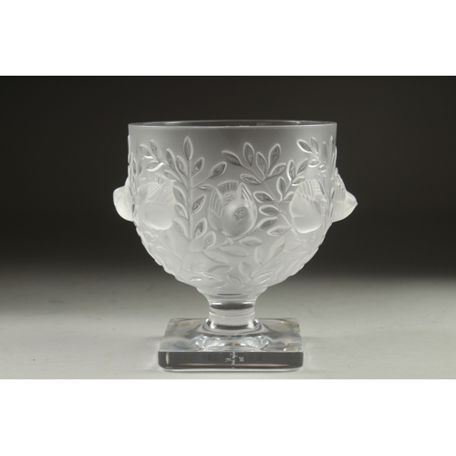 1064 - A LALIQUE FROSTED GLASS BOWL surrounded by chubby birds,  on a plain square base. Signed Lalique, Fr... 