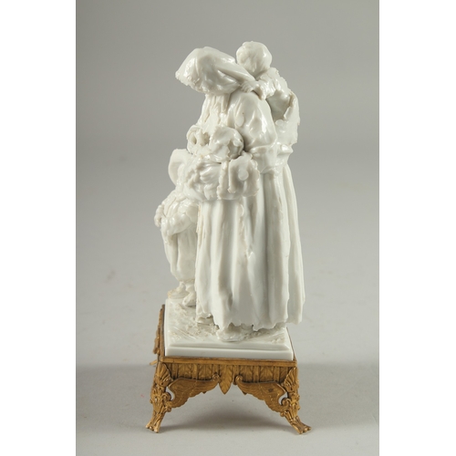 1092 - A GOOD VINCENNES SEVRES WHITE PORCELAIN GROUP of a mother, baby and child by her side, on a square o... 